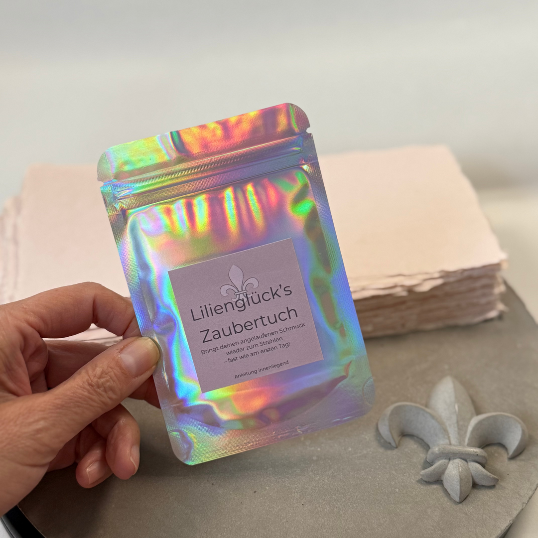 Silberputztuch in Glitzertüte
